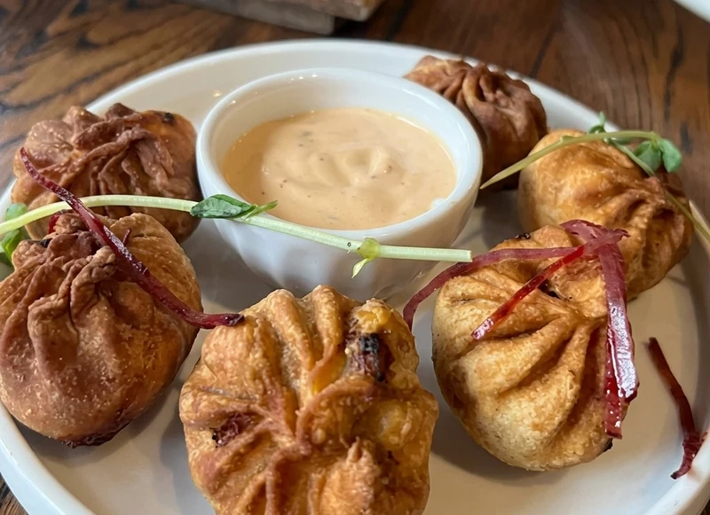 Delicious chicken momos in Calgary, AB